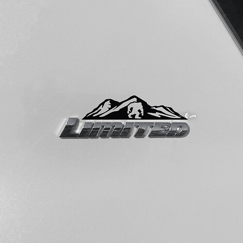 Mountains Yeti Bigfoot Decal Sticker Over Toyota 4Runner Limited Badge